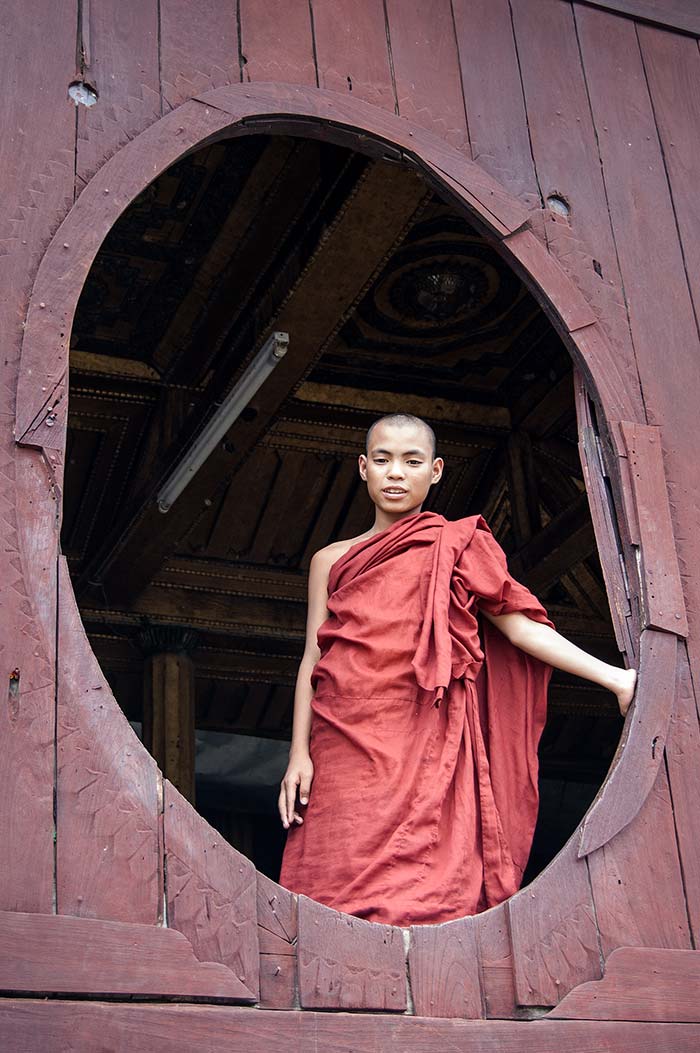 A young monk at the teak Shwe Yan Pyay Monastery.