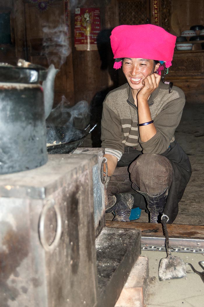 My friendly Tibetan host cooking dinner for me.