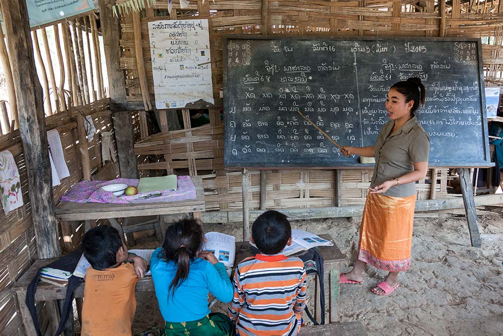 Hmong children learning to speak Lao.
