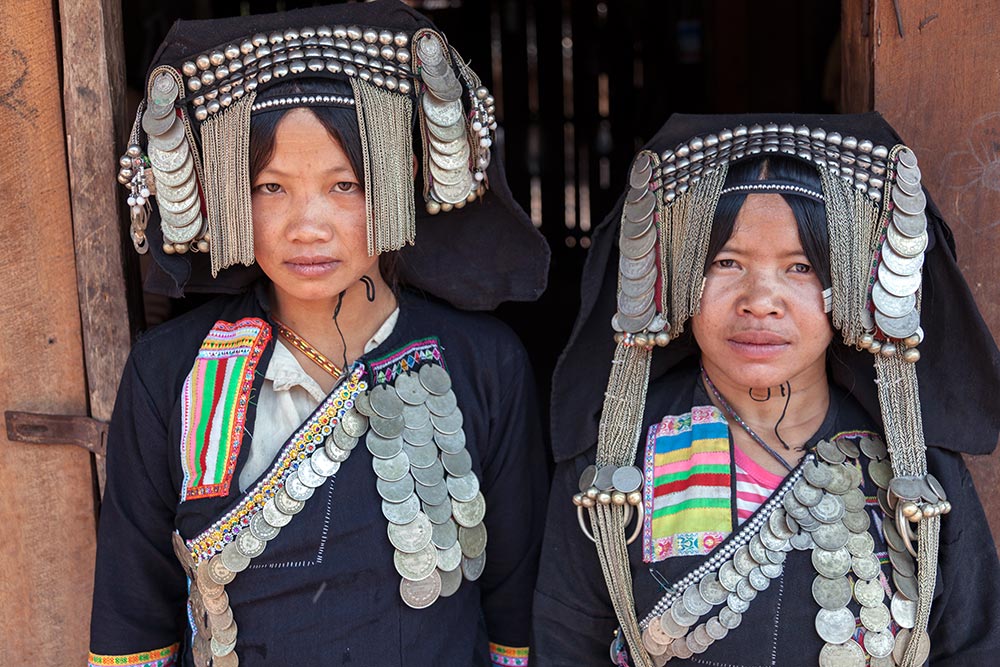 Two Akha Pusho girls who had never seen a foreigner or had their photo taken before.