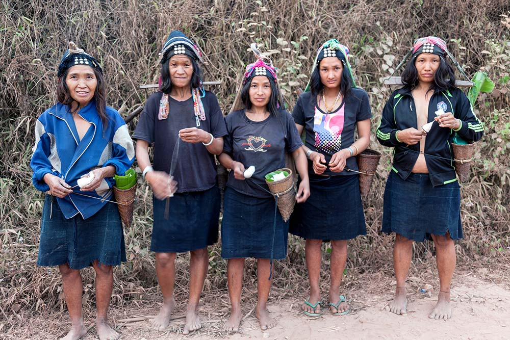 A group of Akha Ghepia women, returning to their village.
