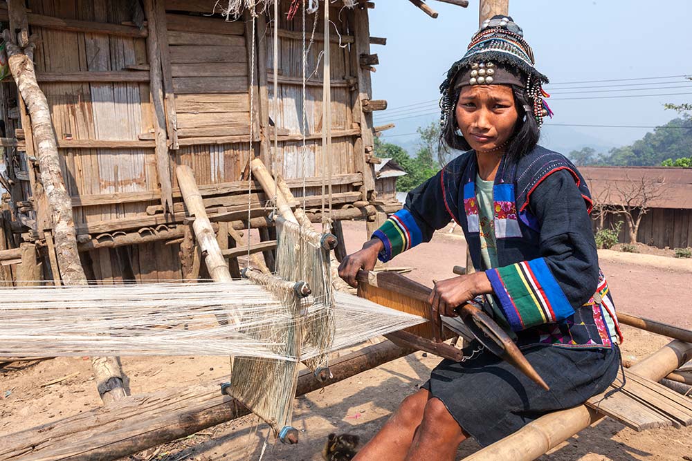 An Akha Ghepia woman weaving.