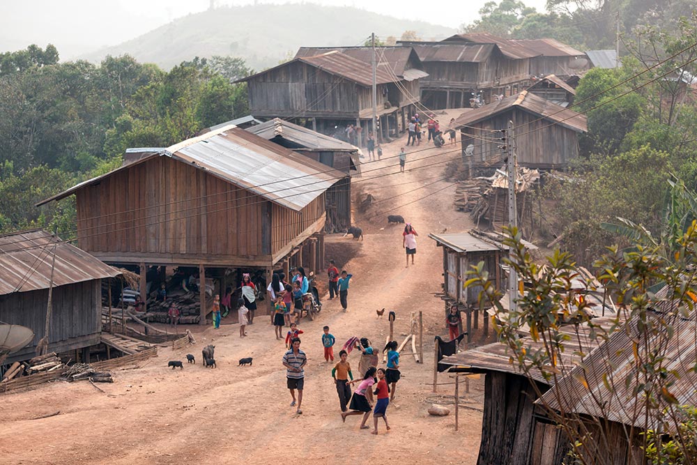 This Akha Ghepia village was buzzing with activity as the sun starting to go down.