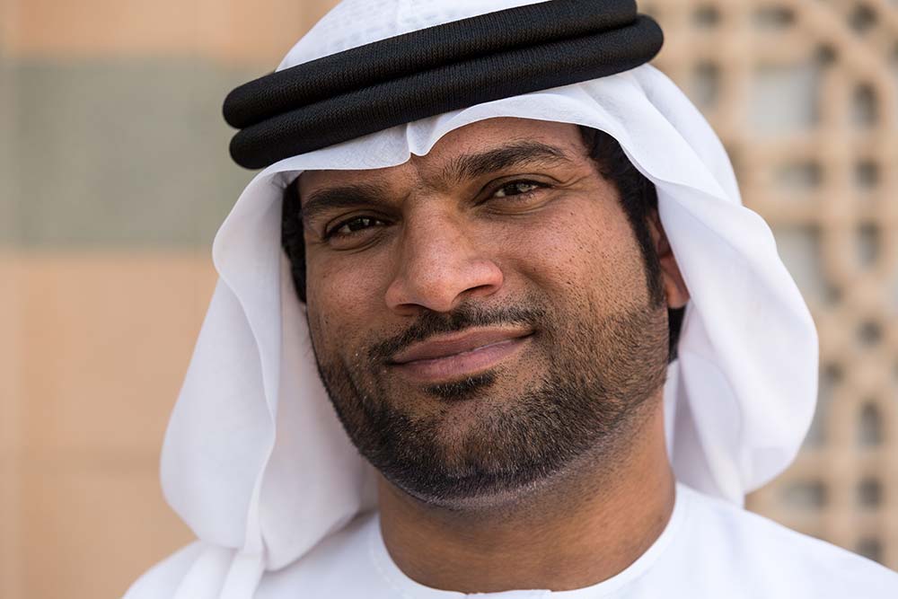 An Emirati man in wearing traditional clothes.