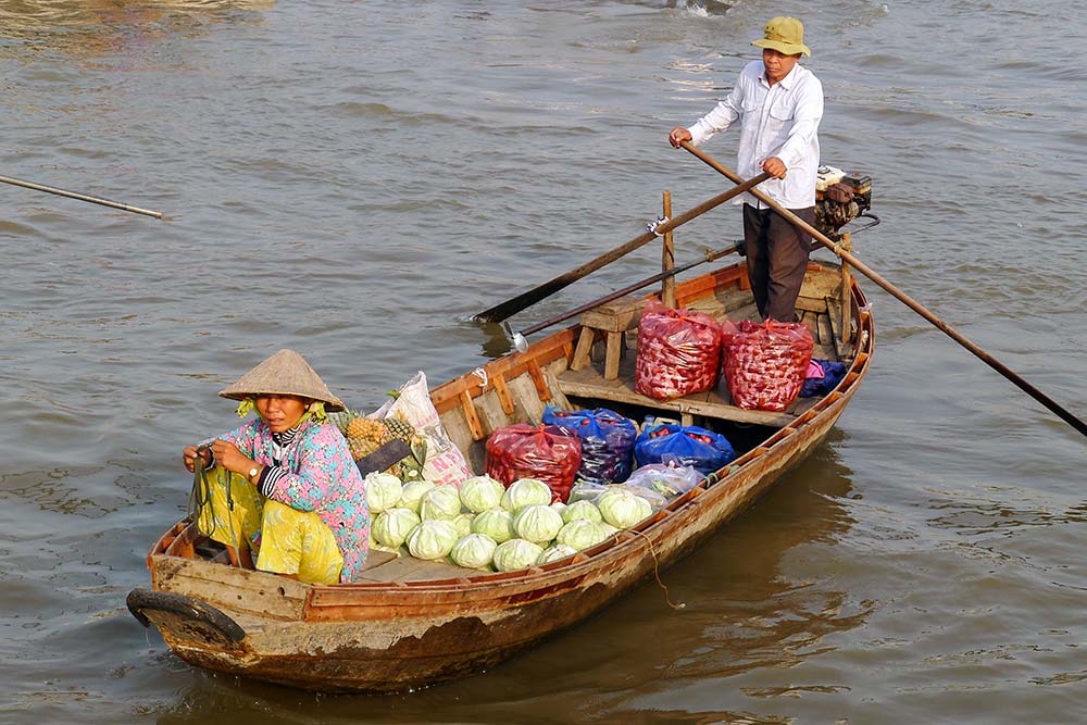 Numerous vendors came right up to our boat to try to sell their produce.