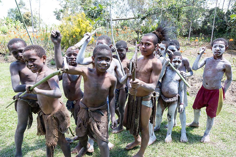 A group of kids from the Jika Mukaka tribe training how to “fight war”