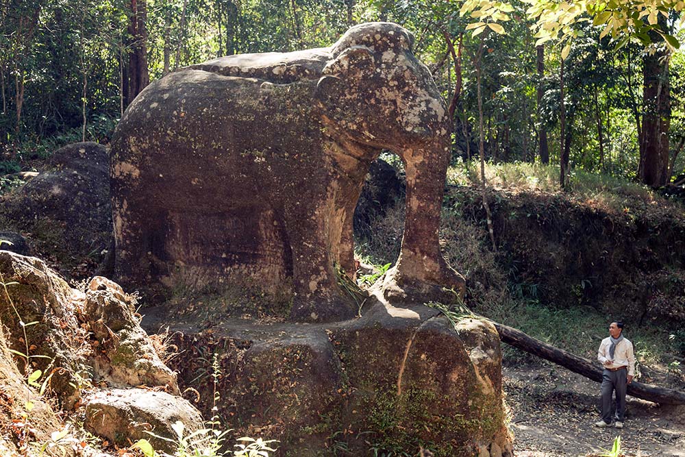 An enormous stone carving of an elephant at Srah Damrei.