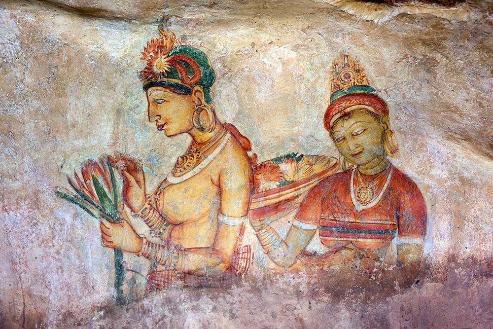 Ancient frescoes painted onto the side of the mountain can be seen on the way up Sigiriya.