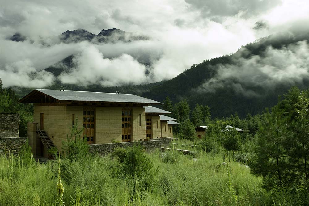 Amankora Paro-- a cozy library and a spa surrounded by woodlands.
